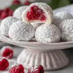 Raspberry Filled Almond Snowball Cookies