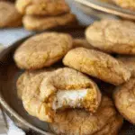 Soft Pumpkin Snickerdoodles with a Surprise Cheesecake Center