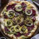 Beet Pesto Pizza with Caramelized Onion, Fennel, and Zucchini